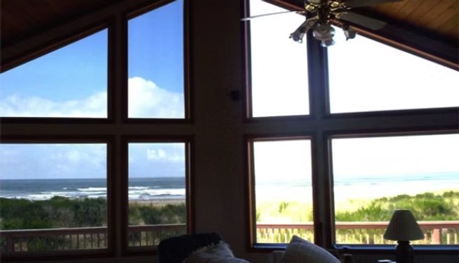 Tinted windows in Algarve home with ocean view, solar control film reducing glare